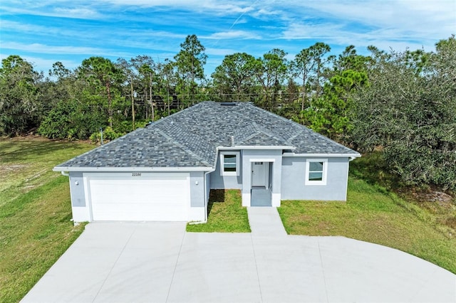 ranch-style house with a front lawn and a garage