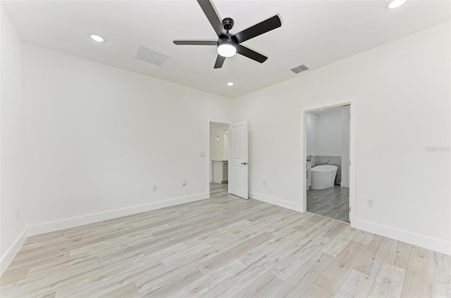 unfurnished bedroom with connected bathroom, light hardwood / wood-style floors, and ceiling fan