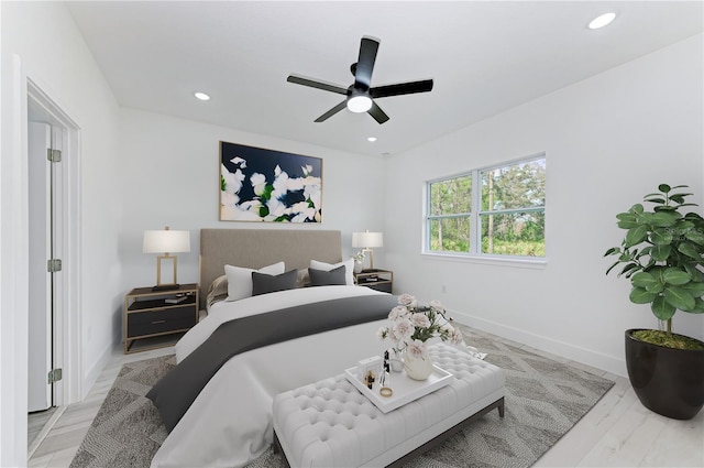 bedroom featuring ceiling fan and light hardwood / wood-style floors