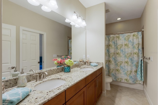 full bathroom with toilet, shower / bathtub combination with curtain, tile patterned floors, and vanity