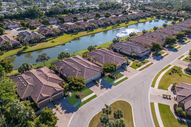 drone / aerial view featuring a water view