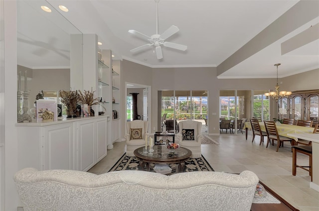 tiled living room featuring ceiling fan with notable chandelier and ornamental molding