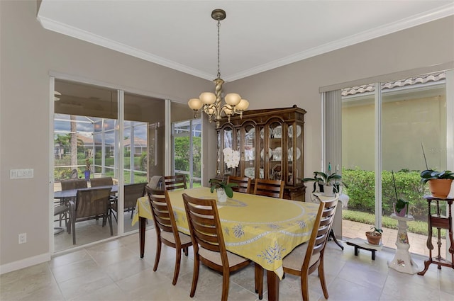 tiled dining room with a chandelier and ornamental molding