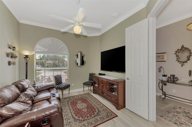 living room with ceiling fan and crown molding