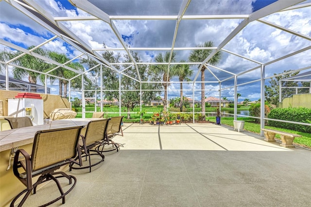 unfurnished sunroom with a swimming pool