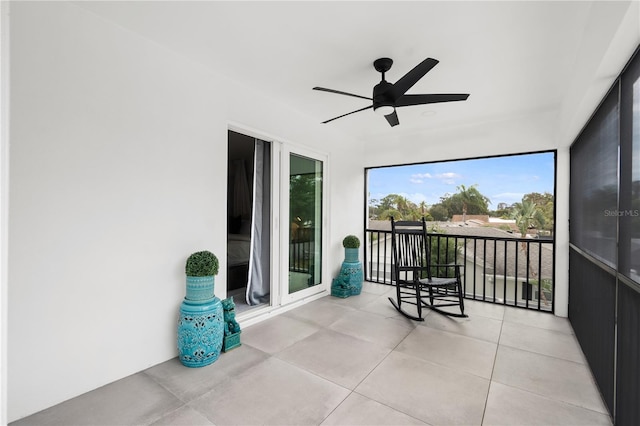 sunroom / solarium with ceiling fan