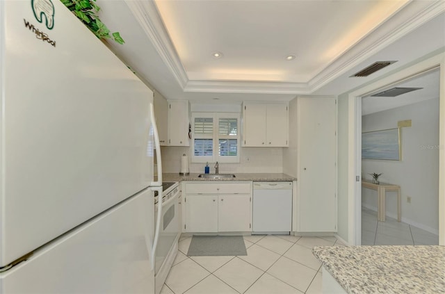 kitchen featuring white appliances, a tray ceiling, white cabinetry, and sink