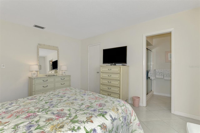 bedroom with light tile patterned floors