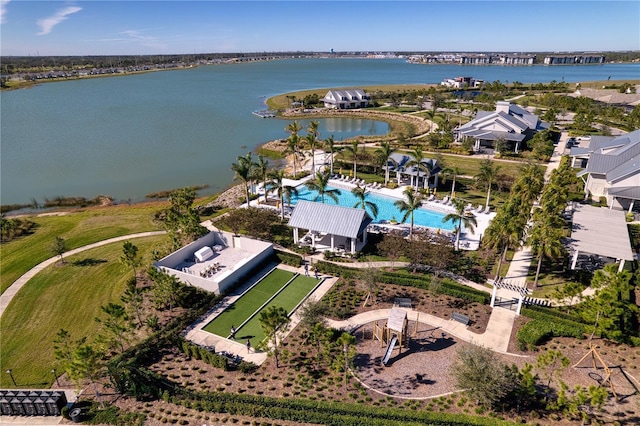 birds eye view of property with a water view