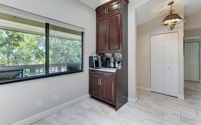 interior space featuring hanging light fixtures