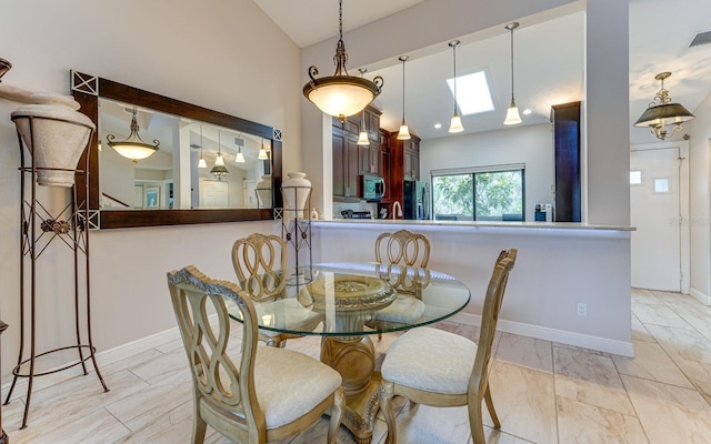 dining area with a skylight