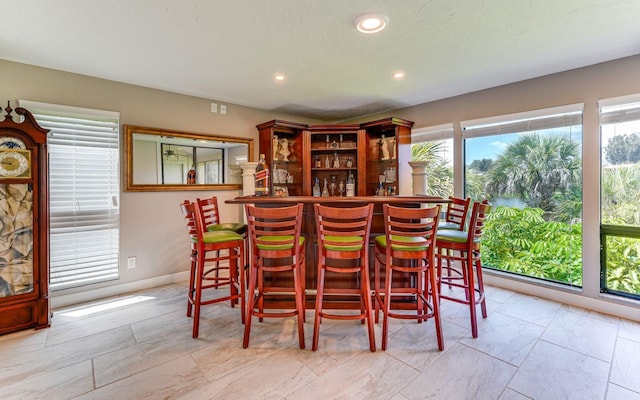 bar featuring plenty of natural light