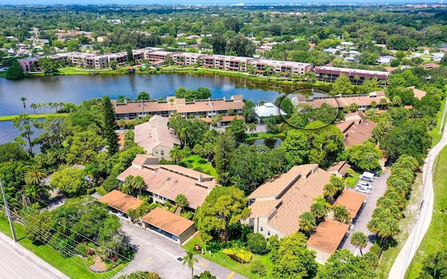 drone / aerial view with a water view