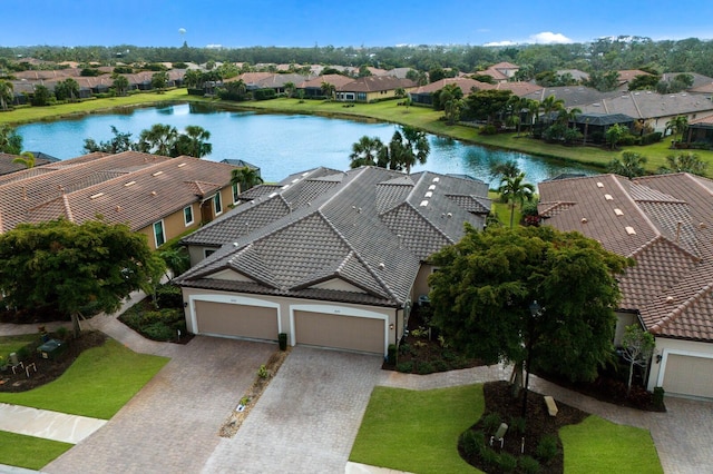 drone / aerial view with a water view