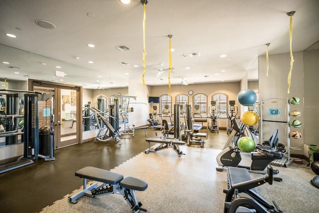 gym featuring french doors