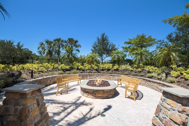 view of patio / terrace featuring a fire pit