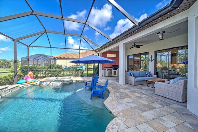 view of swimming pool with ceiling fan, a patio area, an outdoor hangout area, and an in ground hot tub