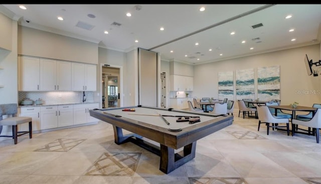 game room with light tile patterned floors, ornamental molding, and pool table