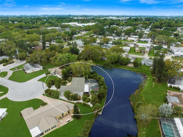 bird's eye view with a water view