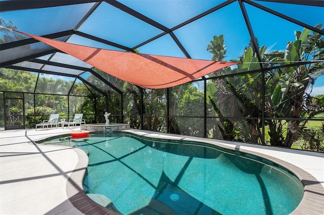 view of swimming pool featuring a patio area