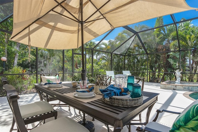 view of patio / terrace with a lanai