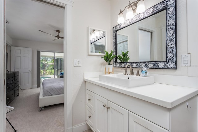 bathroom with ceiling fan and vanity