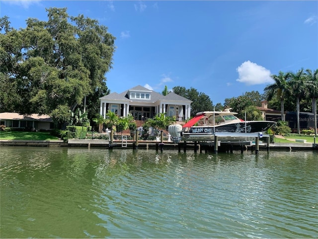 dock area with a water view