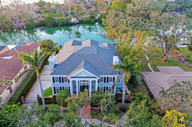 drone / aerial view with a water view