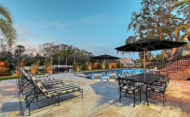 view of pool featuring a patio area