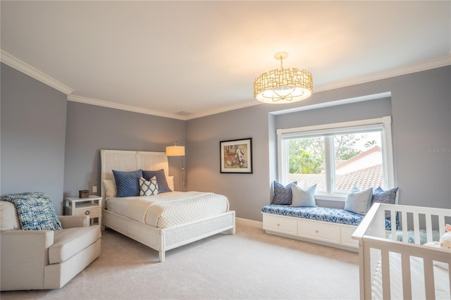 1541 Bay Point Dr, Sarasota, FL 34236 - bedroom with crown molding, light carpet, and baseboards