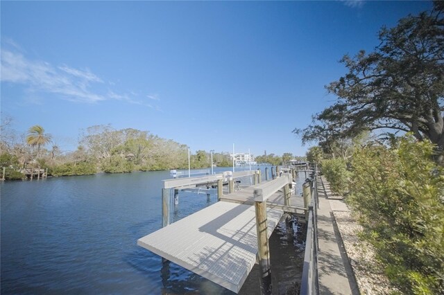 1541 Bay Point Dr, Sarasota, FL 34236 - dock area featuring a water view and boat lift