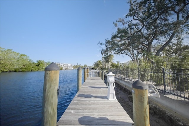 1541 Bay Point Dr, Sarasota, FL 34236 - dock featuring a water view
