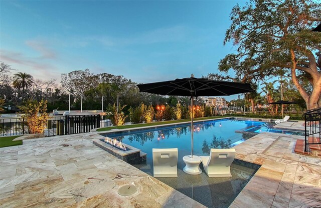 1541 Bay Point Dr, Sarasota, FL 34236 - view of swimming pool with a patio area, a pool with connected hot tub, and fence