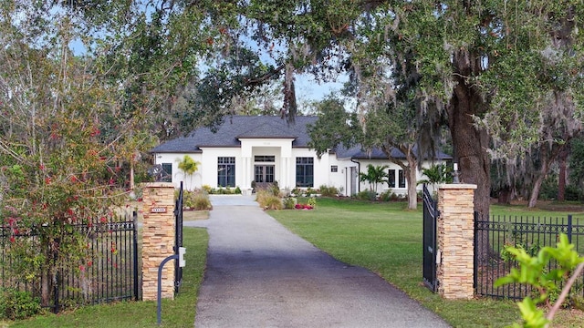 view of front of property with a front lawn