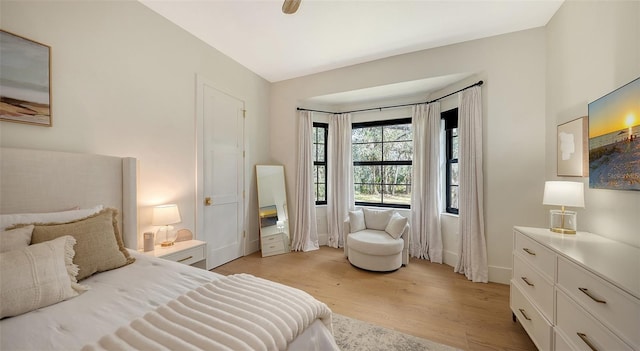 bedroom with light hardwood / wood-style flooring