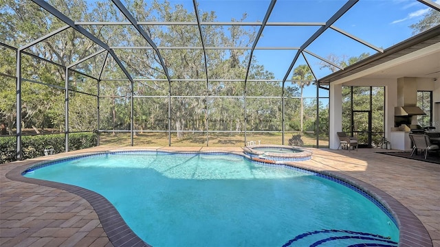 view of swimming pool with glass enclosure, an in ground hot tub, and a patio