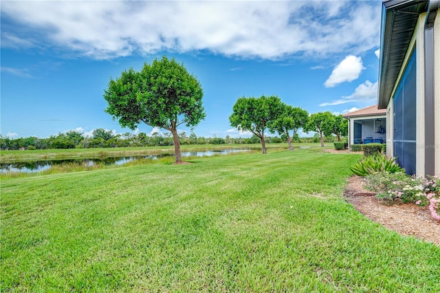 view of yard featuring a water view