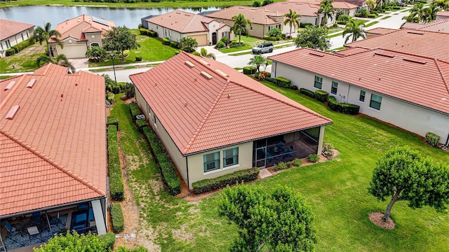 bird's eye view with a water view