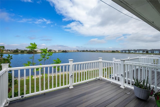 wooden terrace with a water view