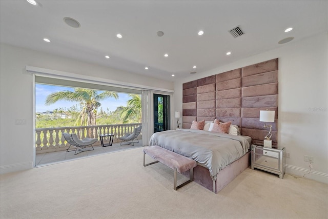 bedroom featuring access to outside, light colored carpet, and multiple windows