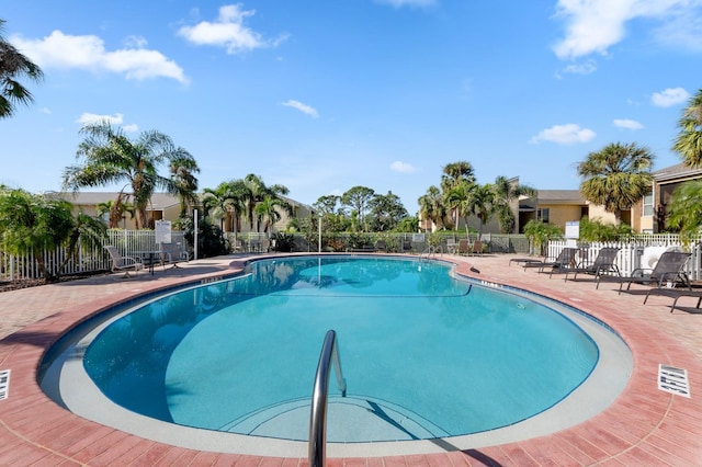 view of swimming pool featuring a patio area