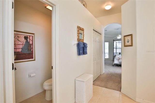 hallway featuring light tile patterned floors