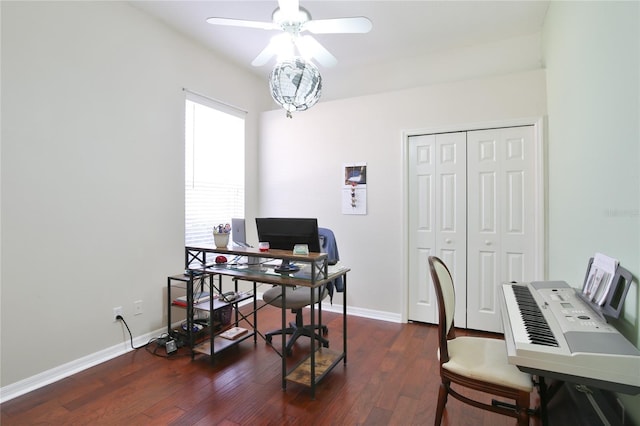 office area featuring dark wood-type flooring and ceiling fan