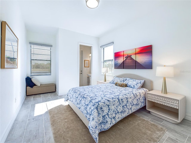 bedroom featuring connected bathroom