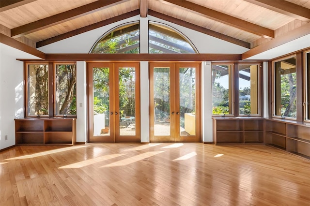 doorway to outside with vaulted ceiling with beams, light hardwood / wood-style floors, wood ceiling, and french doors