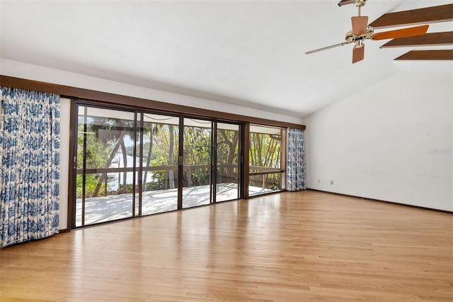 unfurnished living room with ceiling fan, light hardwood / wood-style flooring, and vaulted ceiling