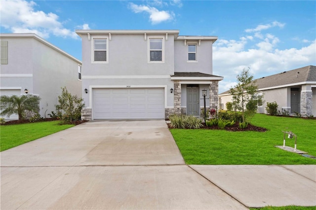 view of front facade featuring a garage and a front lawn