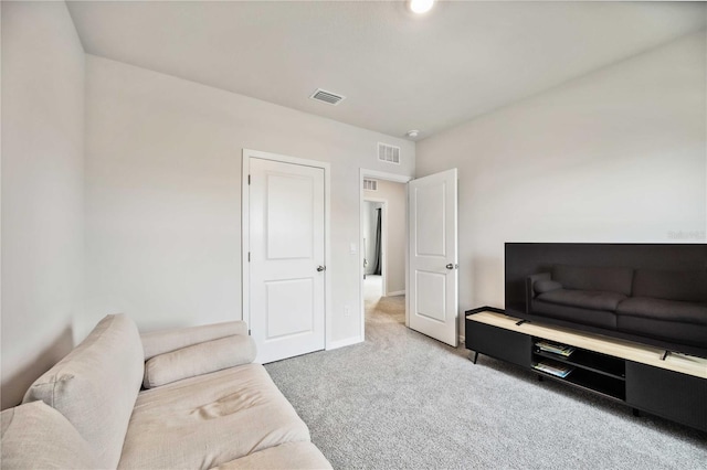 living room with light colored carpet