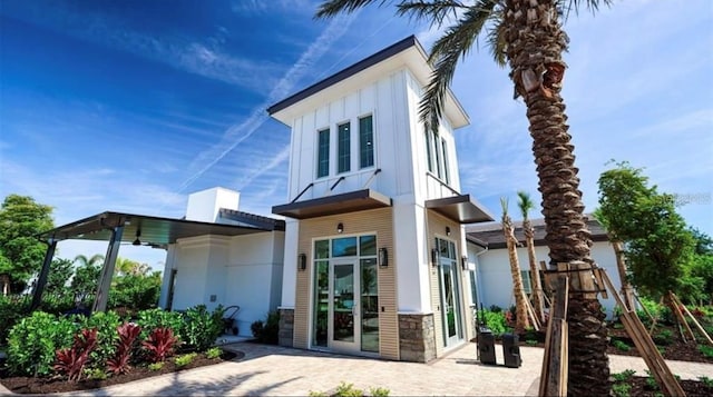 back of house featuring a patio