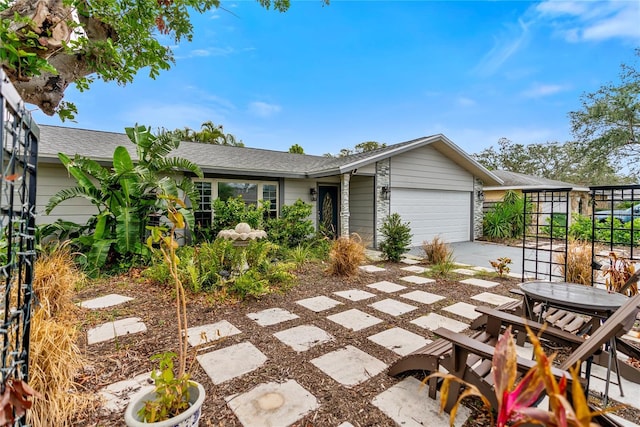 single story home with a garage